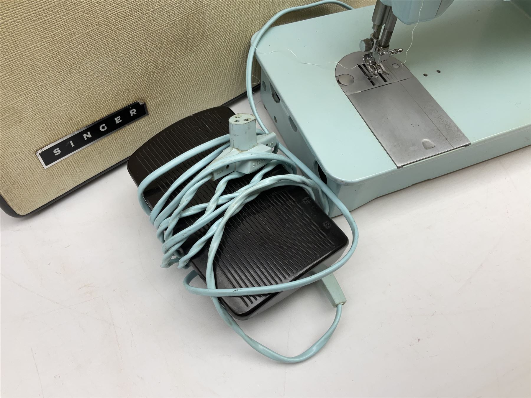 1960s model 347 Singer sewing machine, in baby blue colourway with