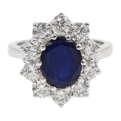  18ct white gold sapphire and diamond cluster ring, sapphire approx 2.25 carat, diamond total weight 1.5 carat  