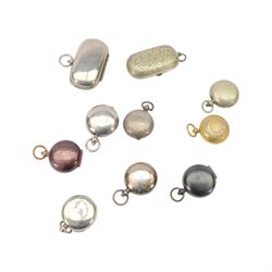 Ten sovereign holders, comprising two oval double sovereign holders and eight single sovereign holders, including brass, silver plate and gunmetal examples