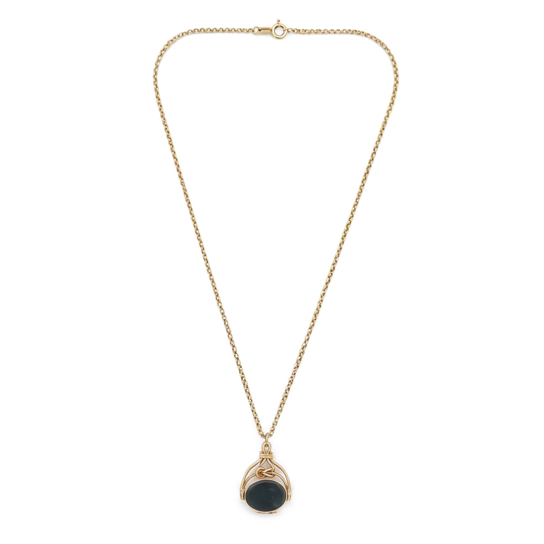 Gold bloodstone and agate opening swivel fob, with knot decoration, Birmingham 1990, on a gold belcher link chain necklace, both 9ct