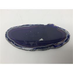 Four purple agate slices of various sizes, polished with rough edges