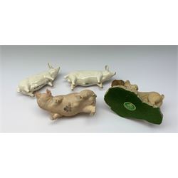 Two Beswick pig figures, CH Wall CH Boy 53, and CH Wall Queen 40, together with an Aynsley figure of a pig, The Boar, and a Master Craft figure of pig and piglets. 