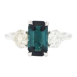 Platinum green tourmaline and diamond three stone ring, single octagonal cut tourmaline of...