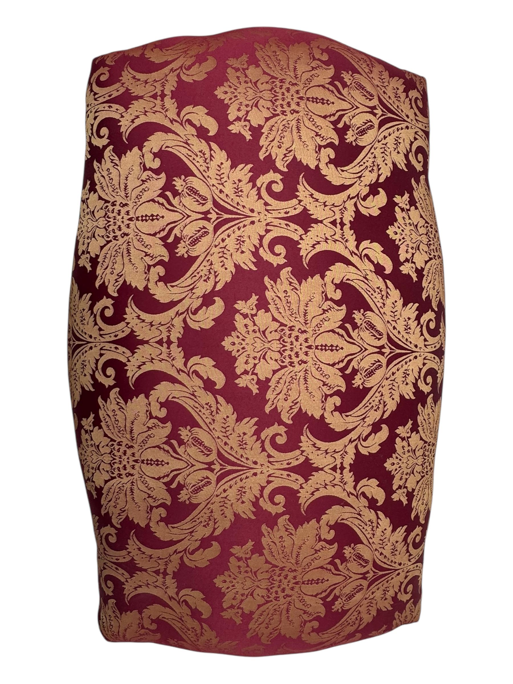 Pair of Louis XV-design giltwood stools, each upholstered in red damask fabric with slight variations in patterns, the carved frames adorned with scrolling foliage and shell motifs, raised on cabriole supports