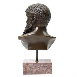 After the antique – a bronze bust modelled on the Artemision Bronze depicting the Greek god Zeus, the bearded head with intense gaze and idealised Classical features, raised on a marble plinth
Notes: the original is now held at the Archaeological Museum of Athens after being recovered from the sea off Cape Artemision, H49cm