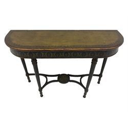 Regency style green finish console table, D-shaped with moulded top, the frieze with repeating foliate pattern, turned and fluted supports joined by a series of shaped stretchers with applied metal bead work and central rose mount