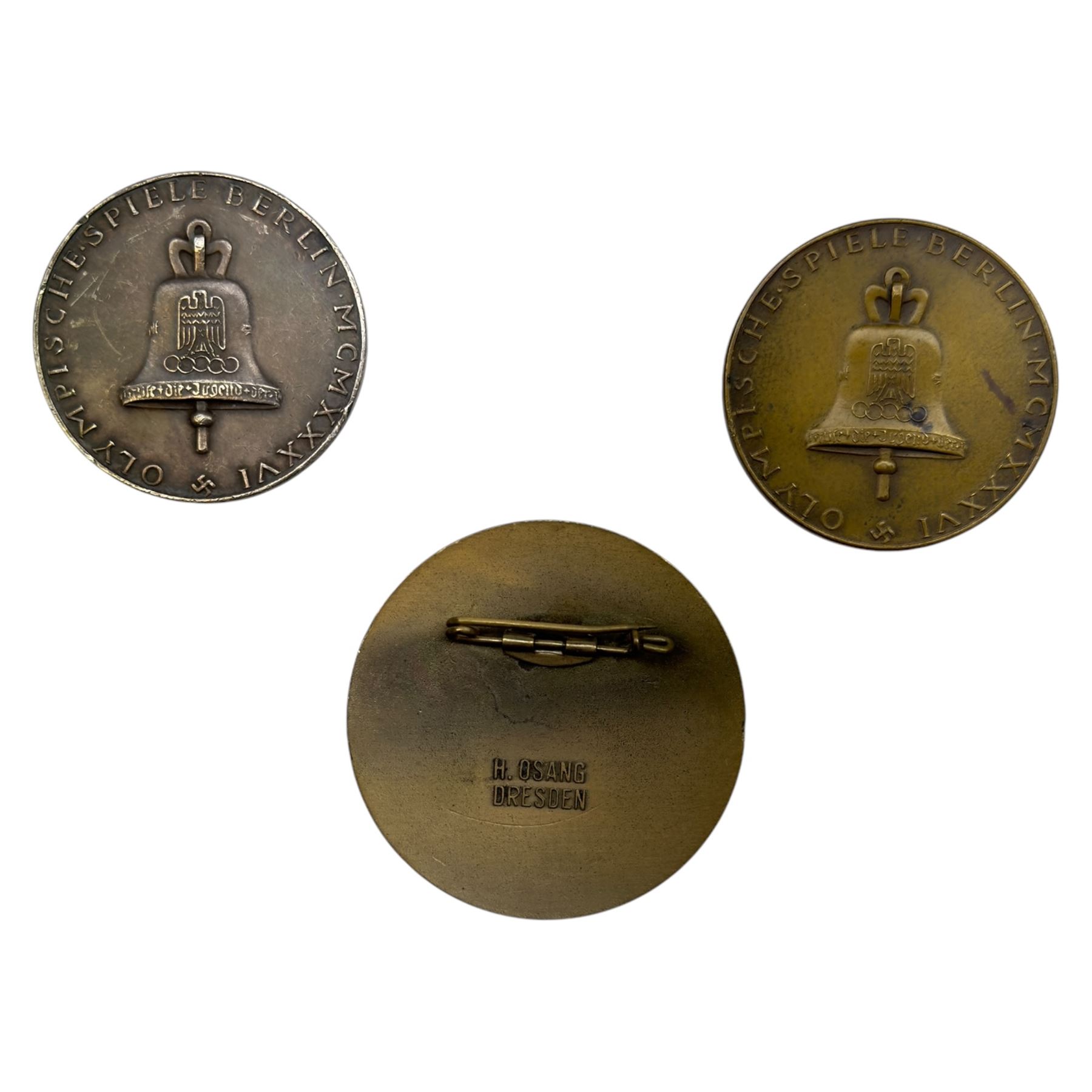 Olympic Badge Berlin 1936, the enamel badge marked H. Osang Dresden to verso and two Commemorative medals, the edge engraved 'Bayer. Hauptmunzemt. Feinsilber'