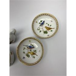 Early 20th century Meissen cabinet miniatures, comprising two teacups and two saucers, jug, and pot and cover, decorated with birds and insects and heightened with gilt, with blue crossed sword marks beneath, tea cup H3cm, saucer D6.5cm