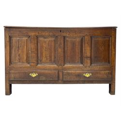 Georgian oak mule chest, moulded rectangular hinged lid over quadruple fielded panel front, the frieze inscribed '17 A Y 57', fitted with two drawers, panelled ends and back, on stile supports