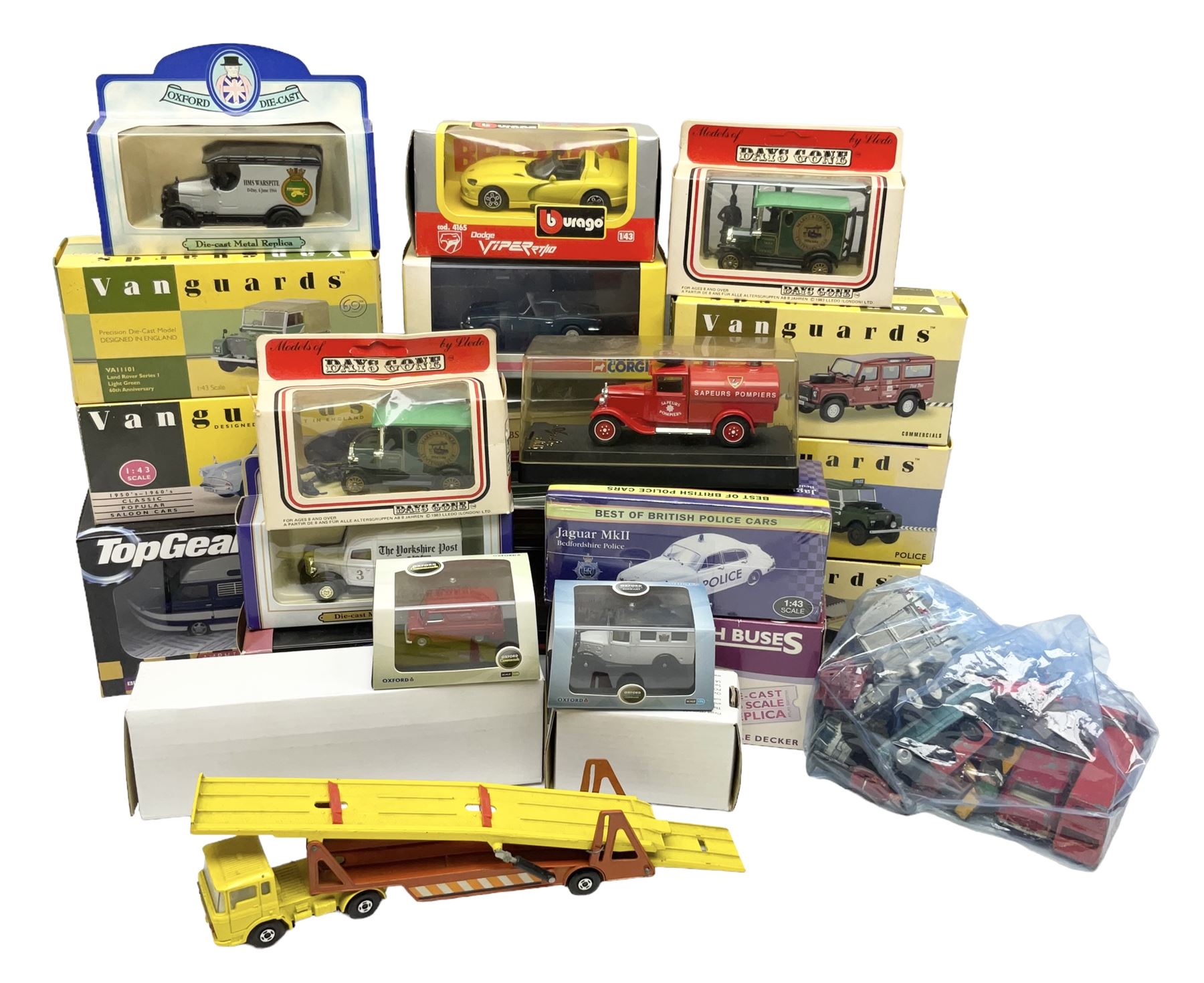 Eight Vanguards die-cast models by Corgi, Hornby and Lledo including Land Rovers, Ford Anglia and Triumph; together with thirteen other modern die-cast models by Bburago, Oxford, Atlas, EFE, Solido etc; all boxed; and small quantity of unboxed and playworn models

