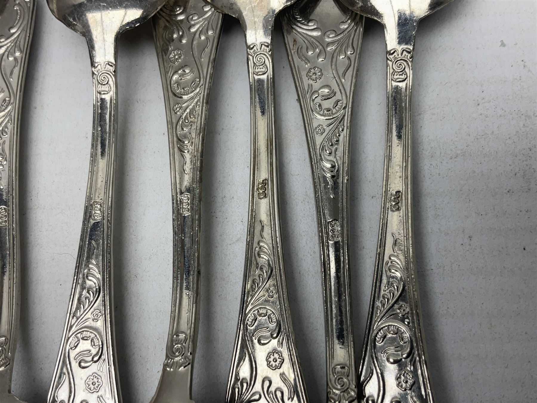 White metal flatware, comprising three table spoons, and ten teaspoons, marked 800, approximate weight 289 grams