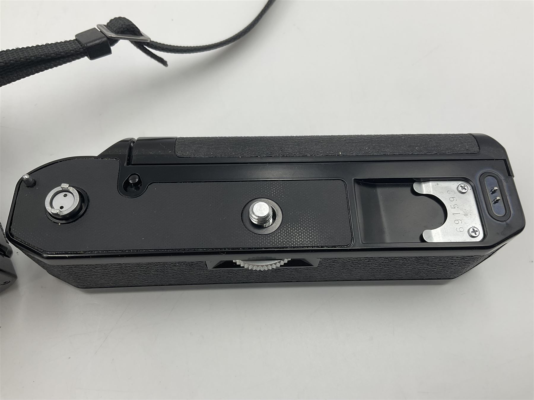 Canon A1 camera body, serial no 884847 with 'Canon FD 55mm 1;1.2 s.s.c' lens serial no 115005