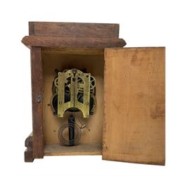 Ansonia- American oak cased 8-day mantle clock striking the hours on a gong. With key.