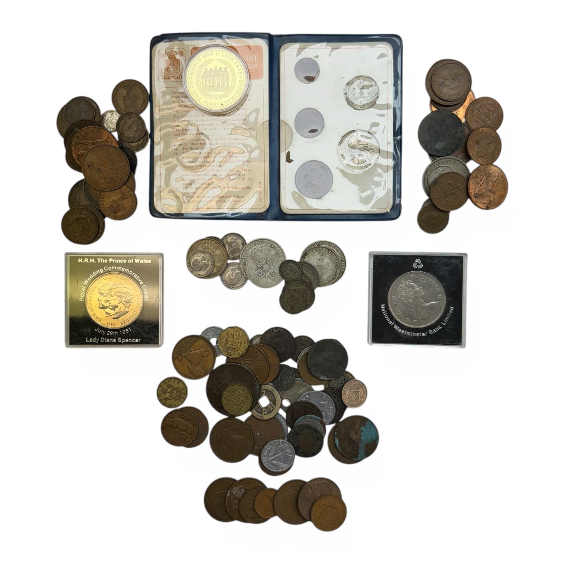 Approximately 95 grams of Great British pre 1947 silver coins, other pre-decimal coinage, commemorative crowns, Britain's first decimal coins in blue wallet, world coins etc