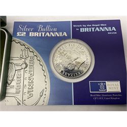 Seven The Royal Mint United Kingdom sterling silver proof crown coins, comprising two 1972, three 1977, 1981 and 1993, all cased with certificates and a Queen Elizabeth II 2001 one ounce fine silver Britannia coin on card (8)