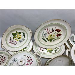 Spode Country Lane pattern part tea and dinner service, comprising six dinner plates, six smaller plates, six teacups and saucers, six coffee cans and five saucers, six shallow bowls, five twin handled soup bowls and six saucers, sauce boat, two jugs, open sucrier, three lidded twin handled tureens, coffee pot, teapot, lidded sucrier, cake plate, two serving dishes and smaller oval dish, all with printed marks beneath (66)