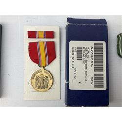 Nine American medals including WW2 Navy and Army Occupation medals, 1939-41 Defence Medal, boxed National Defence Medal and bar, South West Asia Service with bar, Air Force, National Guard and Military achievement medals etc (9)