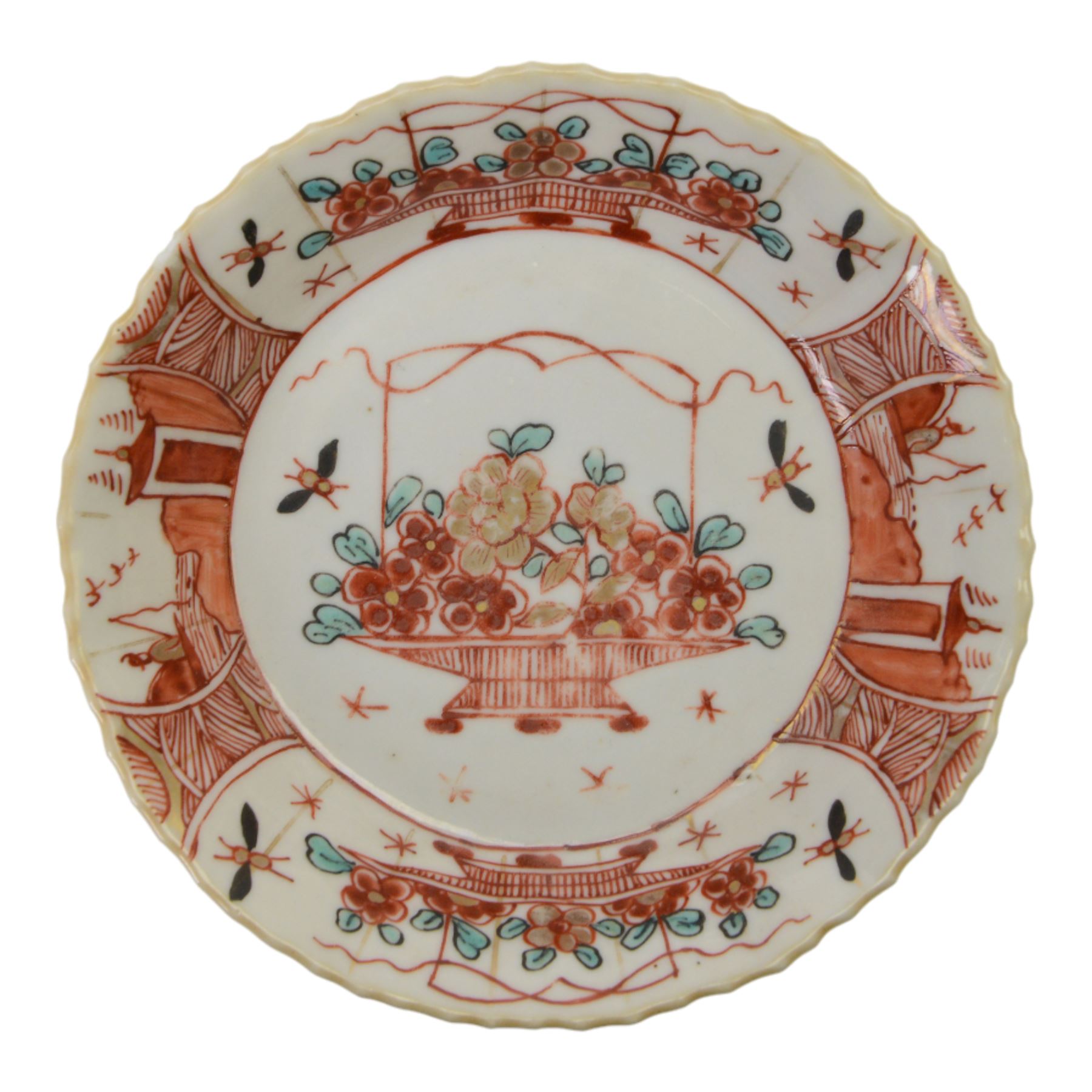 Amsterdam bont teapot, decorated with a basket of flowers, together with two Amsterdam bont saucers of similar design and five other saucers  