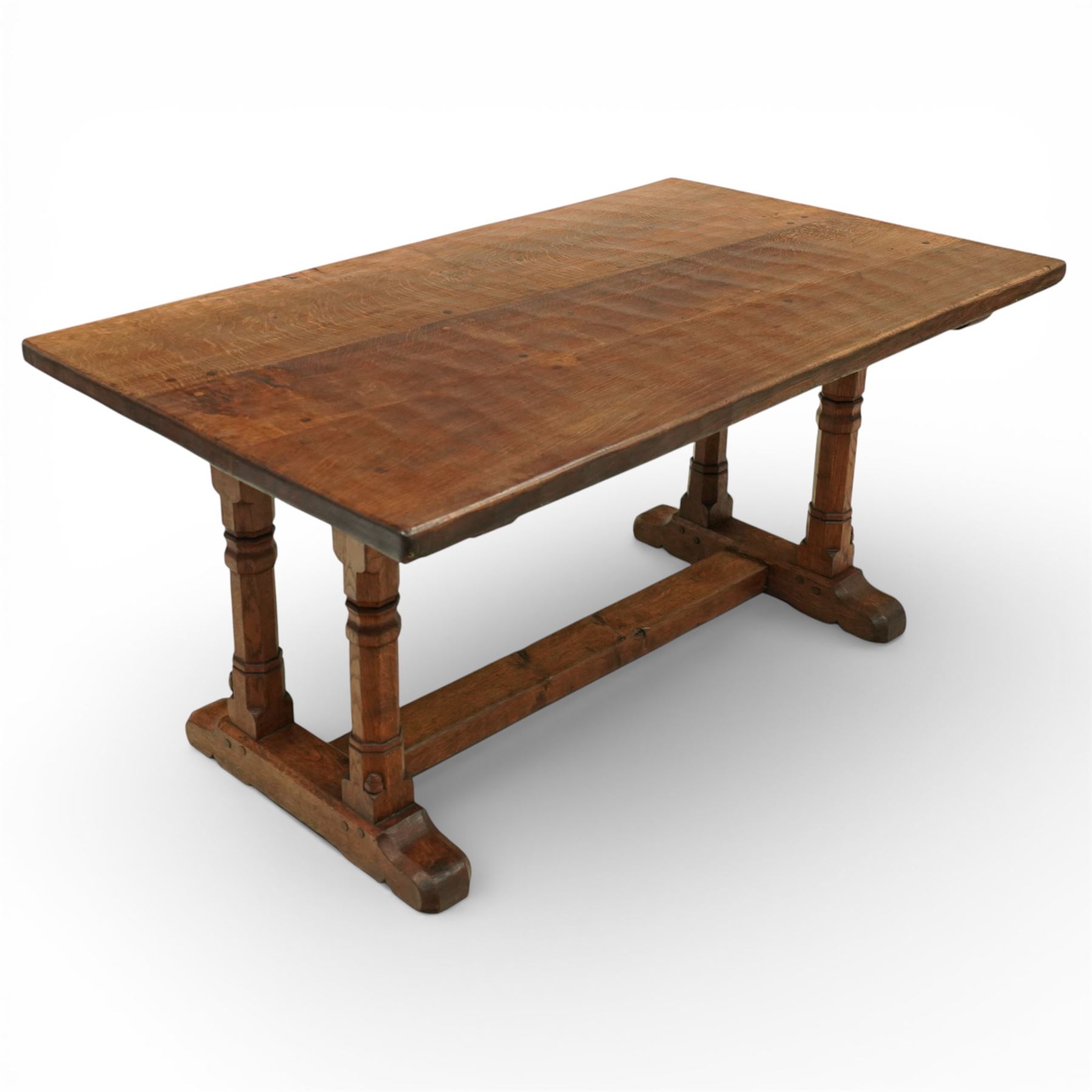 Mouseman - 1937 refectory table, Sir Herbert Baker commission for Westminster Church House, the rectangular adzed plank top above twin octagonal baluster supports united by a pegged stretcher, raised on shaped sled bases carved with a partridge and a loaf of bread, with carved mouse signature to inside leg, by Robert Thompson of Kilburn

The carved loaves reference the original patron, while the partridges are thought to represent Frank Partridge, Bishop of Portsmouth from 1877 to 1941, who played a key role in the founding of Church House and served as its Secretary from 1936 until 1941

Reference
Christie’s ROBERT “MOUSEMAN” THOMPSON; Refectory Table, Lot 188, sold at Christie’s London, commissioned by Sir Herbert Baker KCIE, RA, architect of Church House (opened 1937). Provenance and description available on the Christie’s website
https://www.christies.com/en/lot/lot-4618786