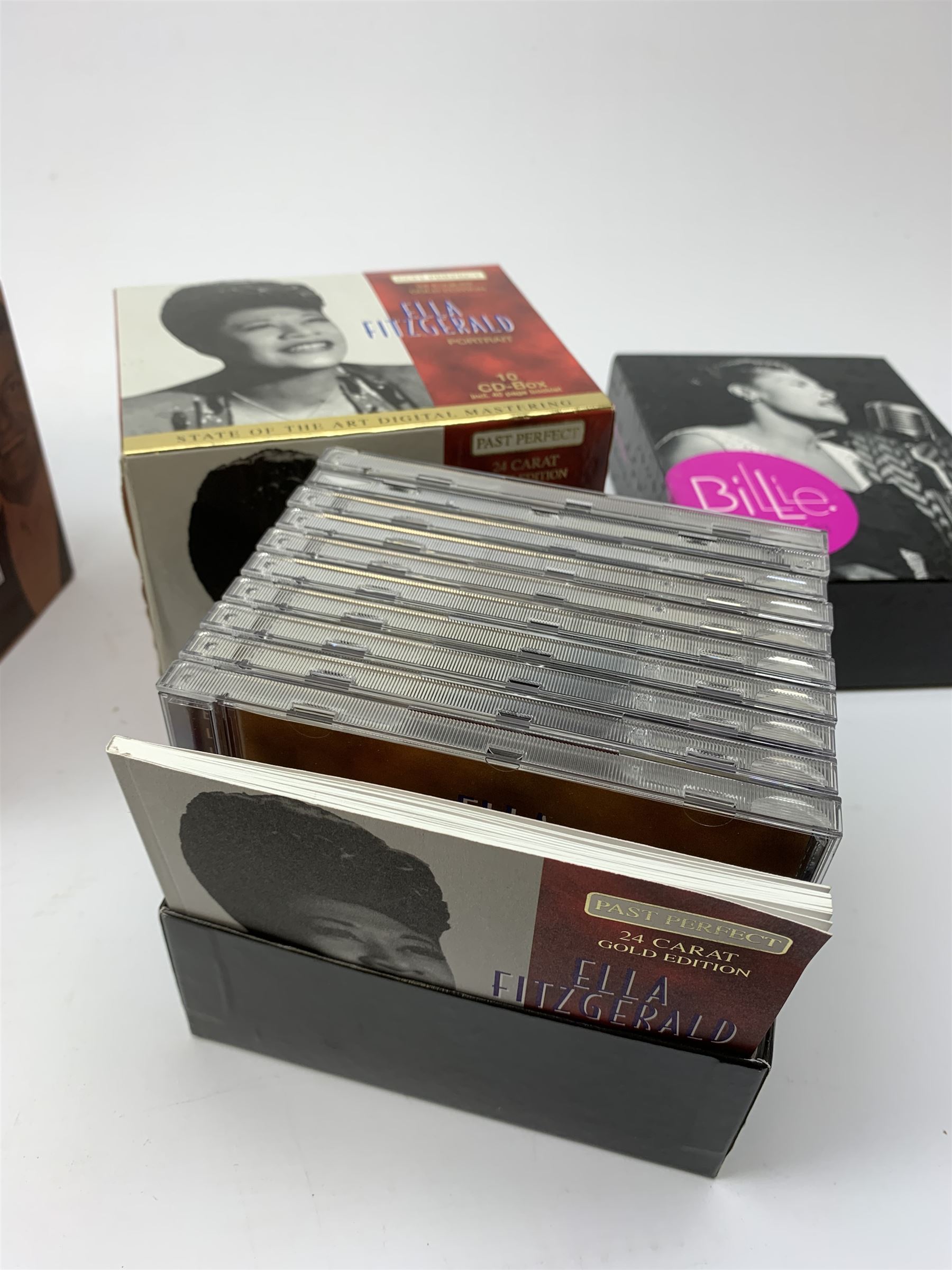 Assorted Jazz and other CD box sets including Frank Sinatra, Gillie Holiday, Ella Fitzgerald, Benny Goodman, Glen Miller, 'Big Band Box, Nat King Cole, Disney, benny Goodman 20 CD box set etc in two boxes