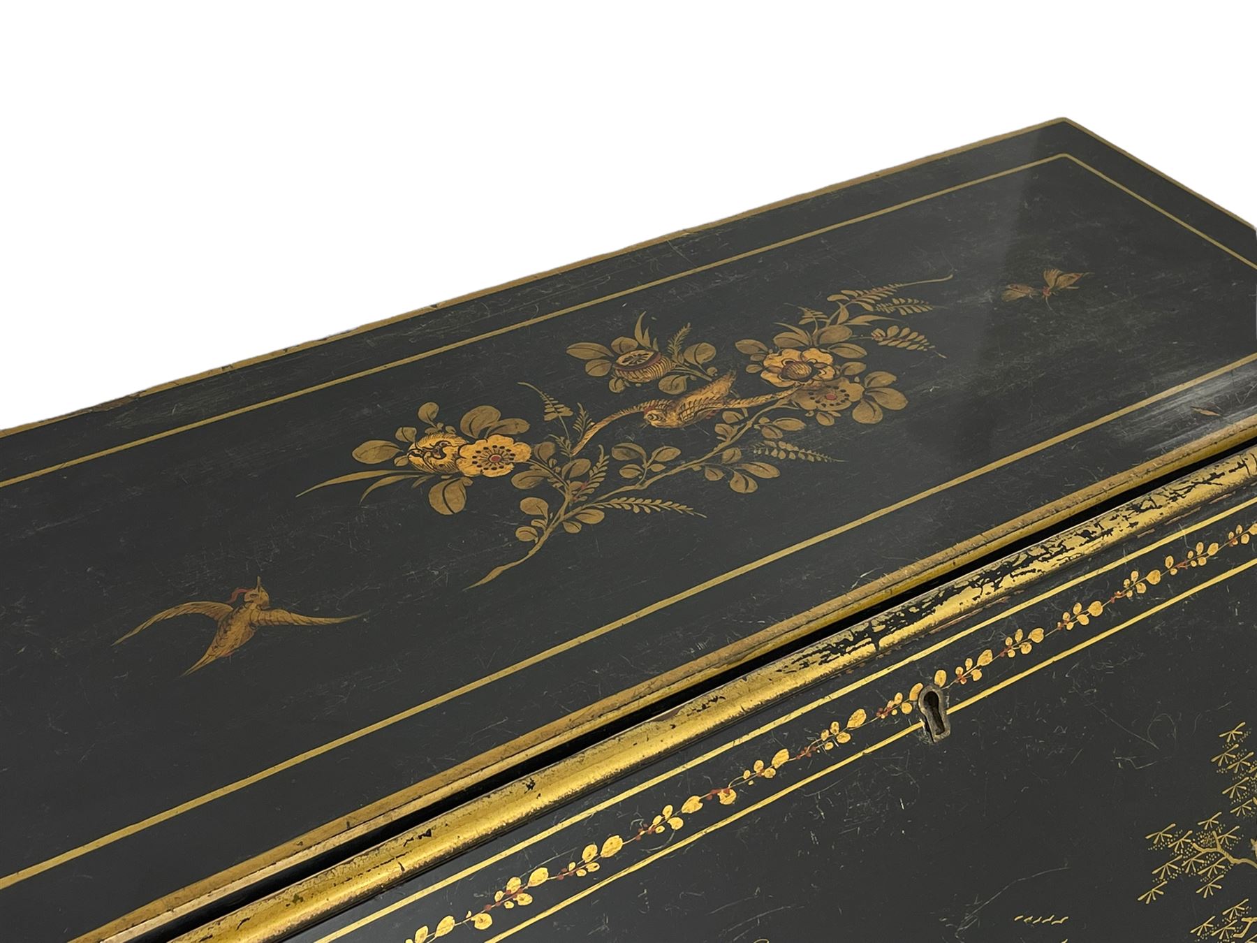 Early 20th century Chinoiserie lacquered bureau, raised gilt decoration, fall front enclosing divisions and drawer, three graduating long drawers, on cabriole supports