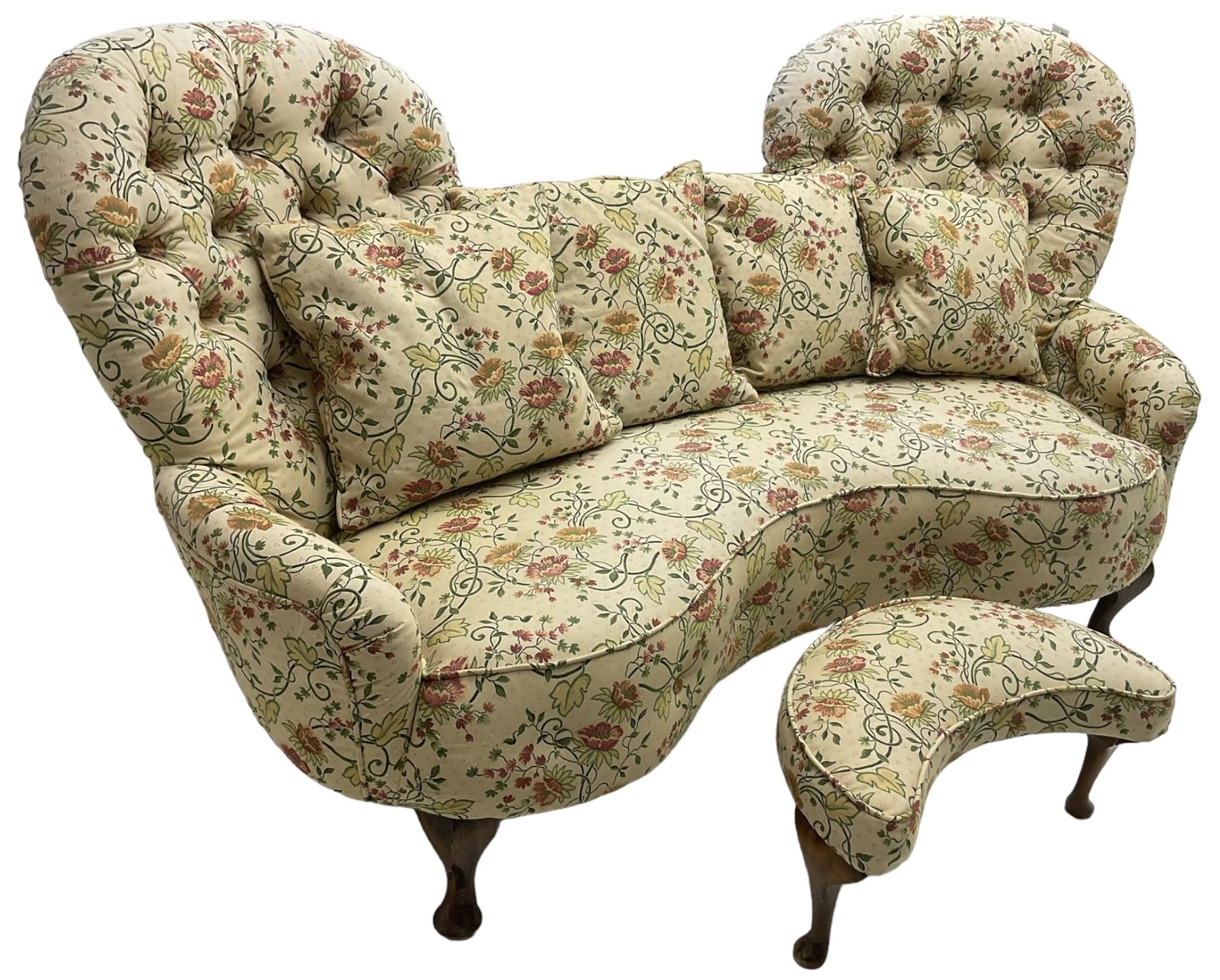 Victorian design hardwood-framed double back settee, upholstered in buttoned floral pattern fabric, curved back over serpentine seat, on cabriole feet, with matching scatter cushions (W182cm, H94cm, D86cm); together with crescent-shaped footstool with cabriole feet (W55cm)