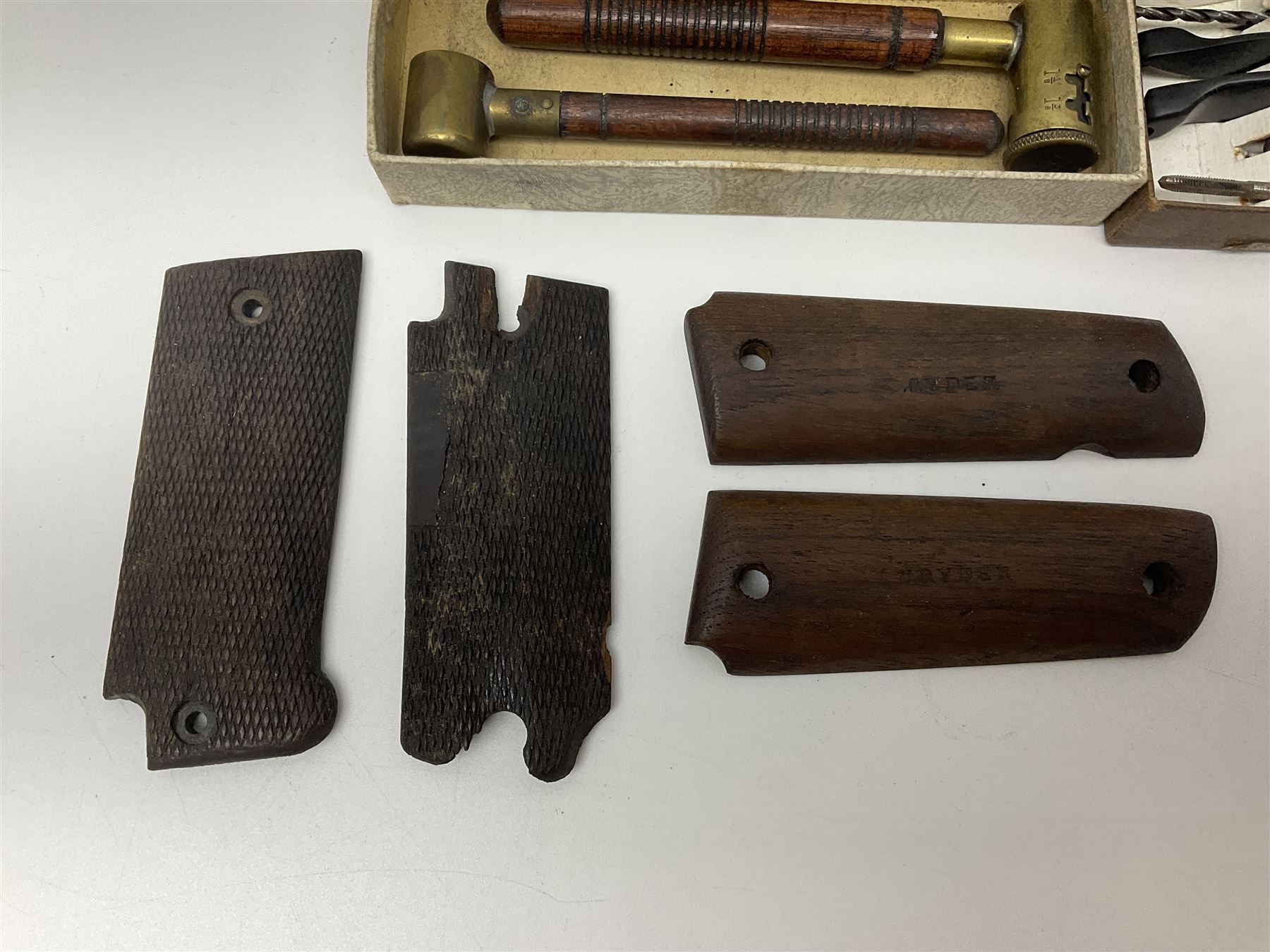 Six pairs of revolver grips;  pair of Lightwood & Son Ltd powder/shot measures in original box; and boxed Colt hammer shroud 