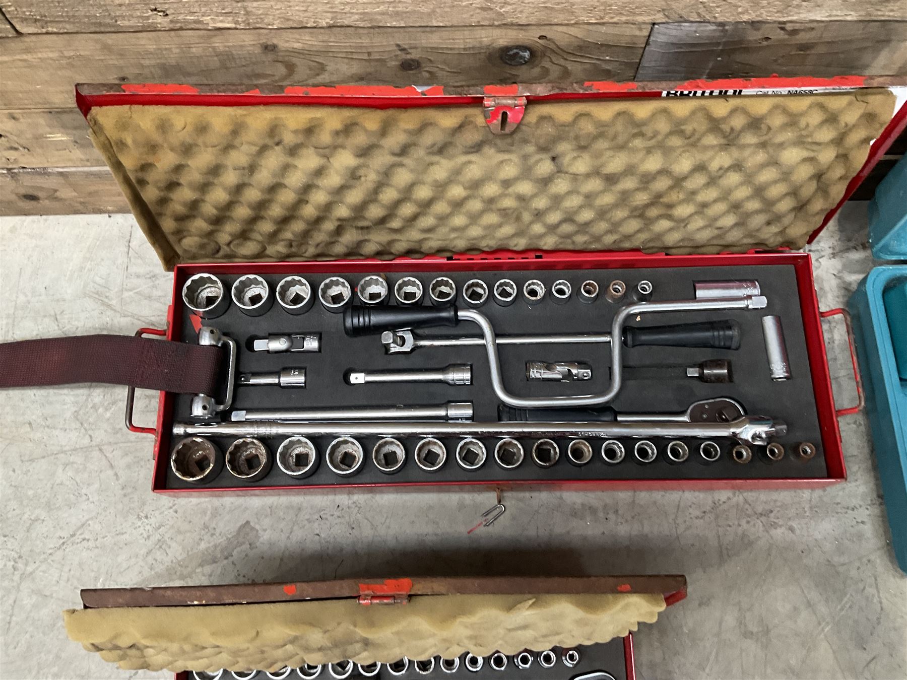 Two Britool socket sets, and two Makita drills