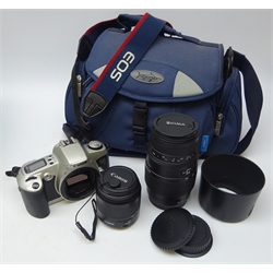  Canon EOS 500 camera, Canon EF 35-80mm lens, Sigma 70-300mm lens, with instructions and camera bag  