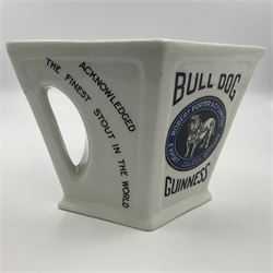 Royal Doulton Guinness advertising whiskey water jug, circa 1930s by Robert Porter and Co. of lozenge angled form, decorated with the  bulldog Guinness, H11cm