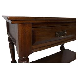 Victorian mahogany side table fitted with two drawers,  rectangular top over two short drawers with moulded facias and brass drop handles, turned front and rear supports joined by an open undertier, on turned feet 