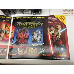 Star Wars - four Funko 'Bobble Head' figures 'Princess Leia', 'Anakin Skywalker', 'Clone Trooper Denal' and 'Han Solo'; and four De Agostini figures; all boxed; and assorted ephemera including posters, Tazo Collector's Force Pack, 2005 Annual, fact files, catalogues, brochures etc