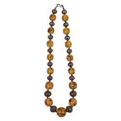 18ct gold spiral pendant, silver butterfly brooch and a beaded necklace