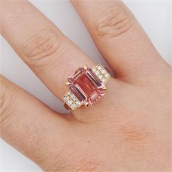 18ct rose gold pink tourmaline and diamond ring, emerald cut tourmaline of 5.21 carat, with milgrain set round brilliant cut diamond stepped design shoulders, stamped 750, with World Gemological Institute report