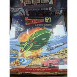 Gerry Anderson interest collectables and toys, including Carlton Thunderbirds Tracy Island, Matchbox Stingray Marineville Headquarters, both boxed, Matchbox carded Thunderbirds and Stingray figures and vehicles, Captain Scarlet and Joe90 collectables, etc