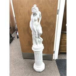 White painted composition garden figure of scantily clad classical female on plinth, H155cm