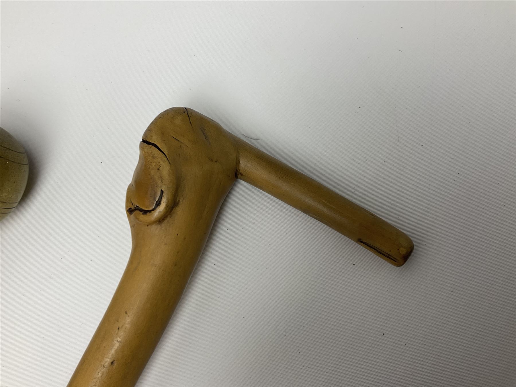 Four wooden walking canes, including a carved mahogany snooker cue example, tallest H86cm