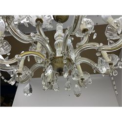 Victorian style glass eight branch chandelier, with drip trays, brass tone support, and drops