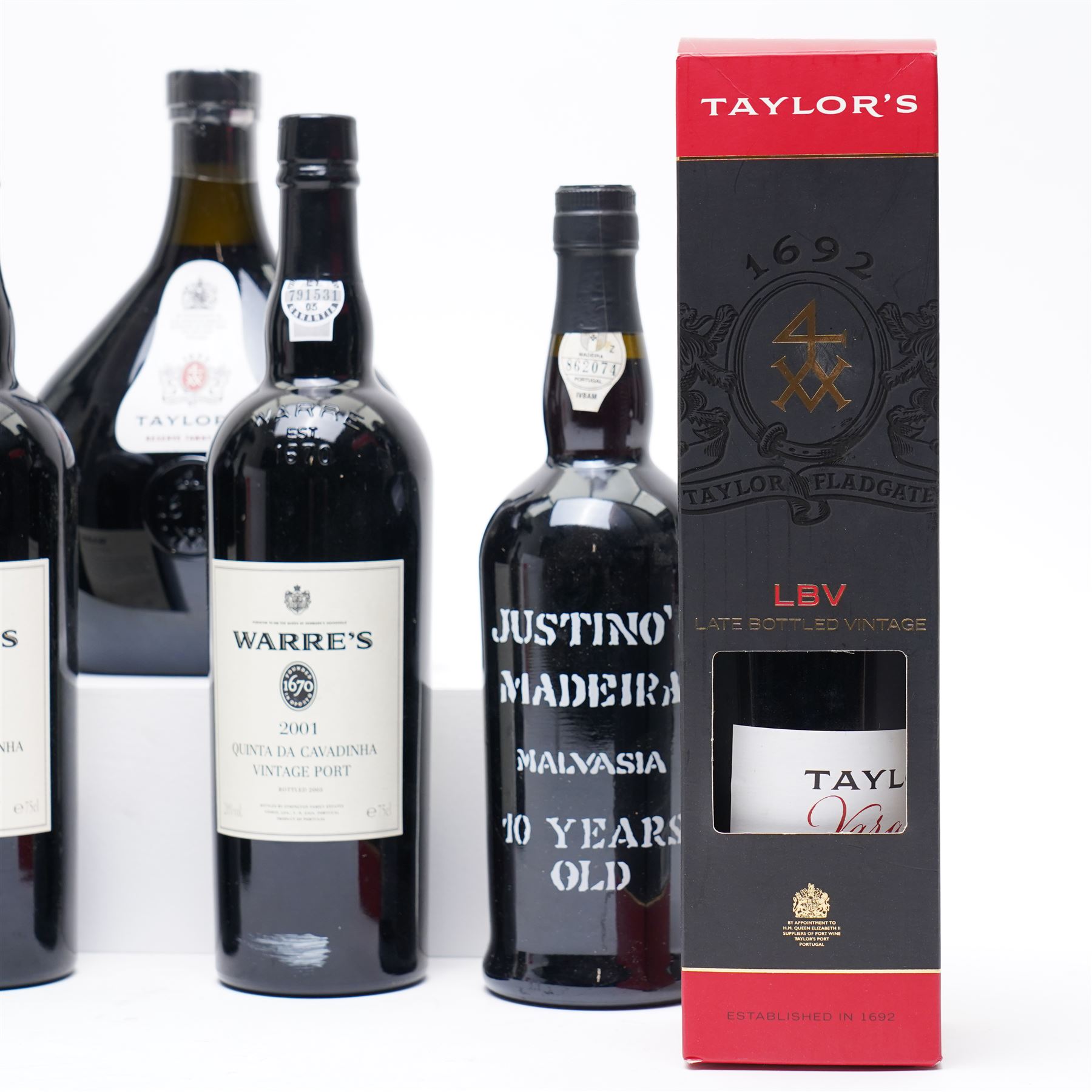 *One bottle of Quinta Do Noval Vintage Port 1966, unknown contents and proof; one bottle of Justino's Madeira 10 years old, 750ml, 19% vol, one bottle of Taylor's Reserve Tawny Port, limited edition, one litre, 20% vol, one bottle of Taylor's LBV Port 2001, 75cl, 20.5% vol, boxed and three other bottles of PortFrom the Kirkham Hall Attic & Cellar Collection, sold without reserve