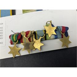 Representative display of WWII Campaign stars comprising 1939-1945 Star, Atlantic Star, Air-Crew Europe Star, Africa Star and Pacific Star; together with the corresponding group of miniatures; all with ribbons