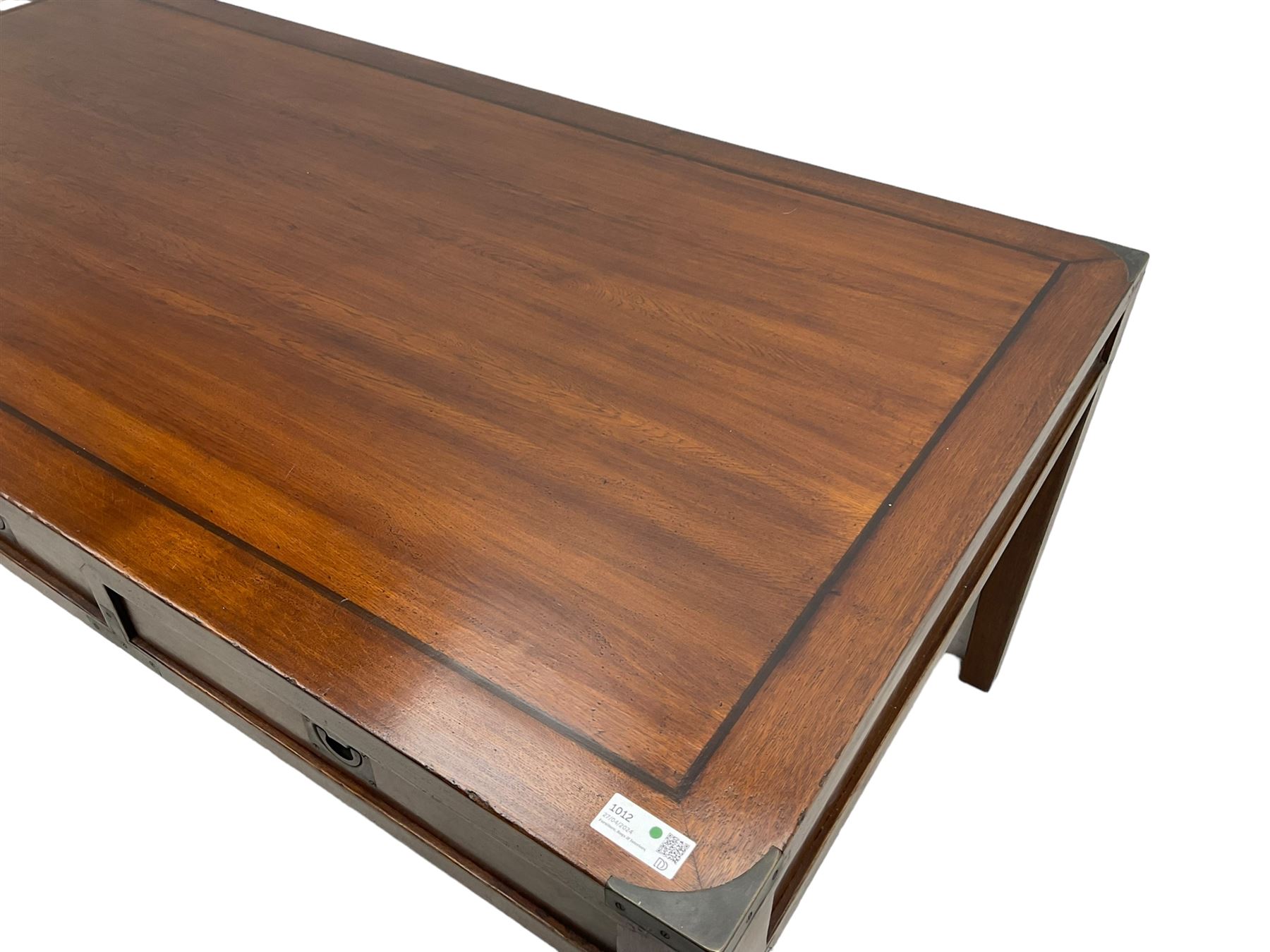 20th century military campaign design oak office or dining table, rectangular top with ebony banding and metal mounted corners, fitted with six drawers with recessed handle plates, on square tapering supports