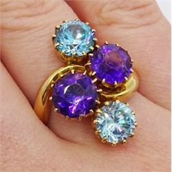  Edwardian 18ct gold four stone blue zircon and amethyst crossover ring, makers mark HPH, Birmingham 1902  
[image code: 4mc]