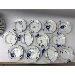 Royal Copenhagen tea and dinner service for twelve place settings, decorated in the Mega Blue Fluted pattern, pattern number 622, comprising dinner plates, salad plates, bowls with pierced rim, smaller bowls, tea cups, and saucers, dinner plates D27.5cm, salad plates D22cm