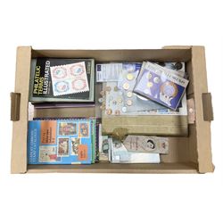 Stamps, coins and ephemera, including postcards, reference books etc, in one box