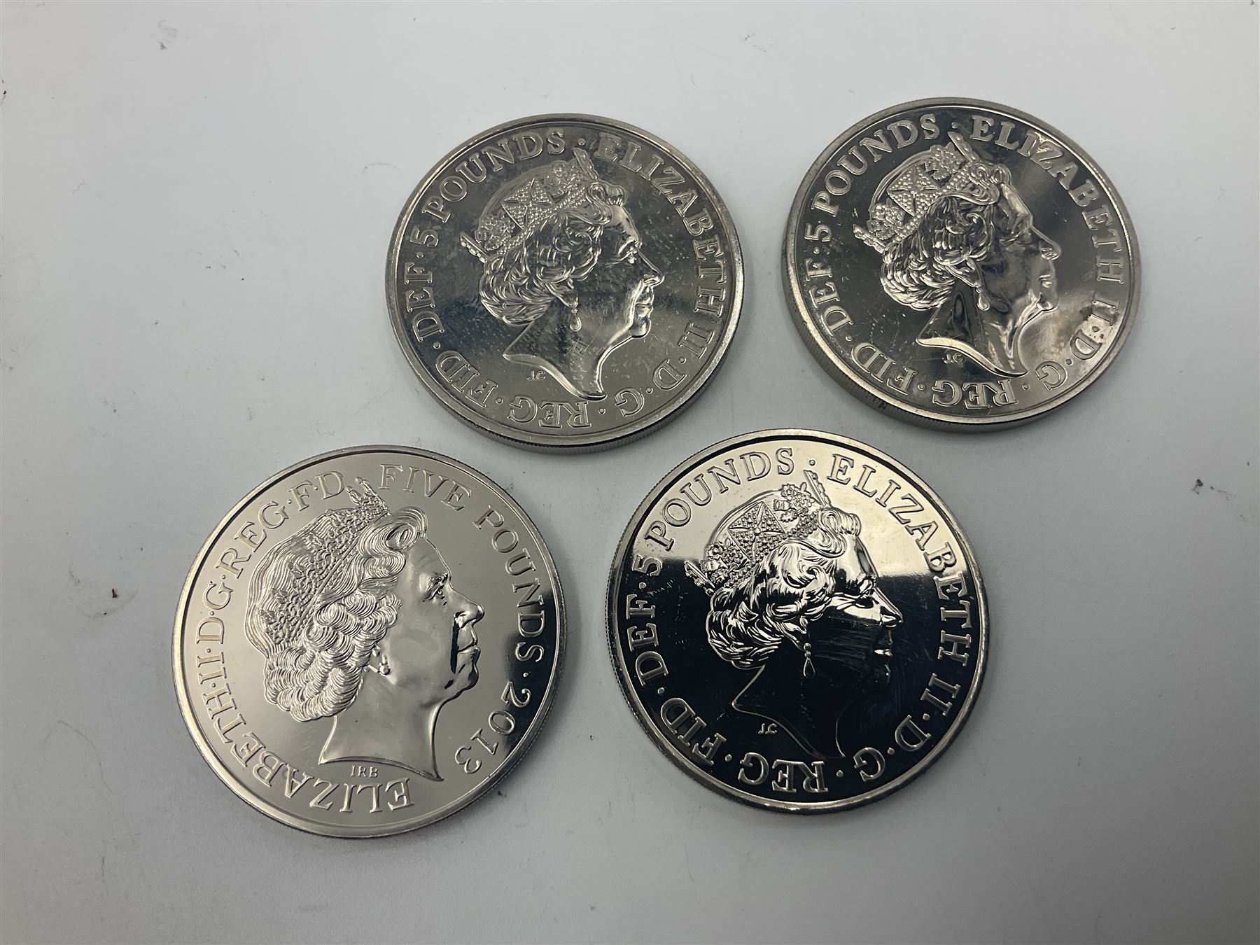 Seventeen Queen Elizabeth II United Kingdom five pound coins