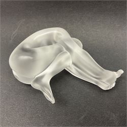 Lalique Nude Temptation, a frosted glass figure of a woman crouching with leg outstretched, in original box, H8cm