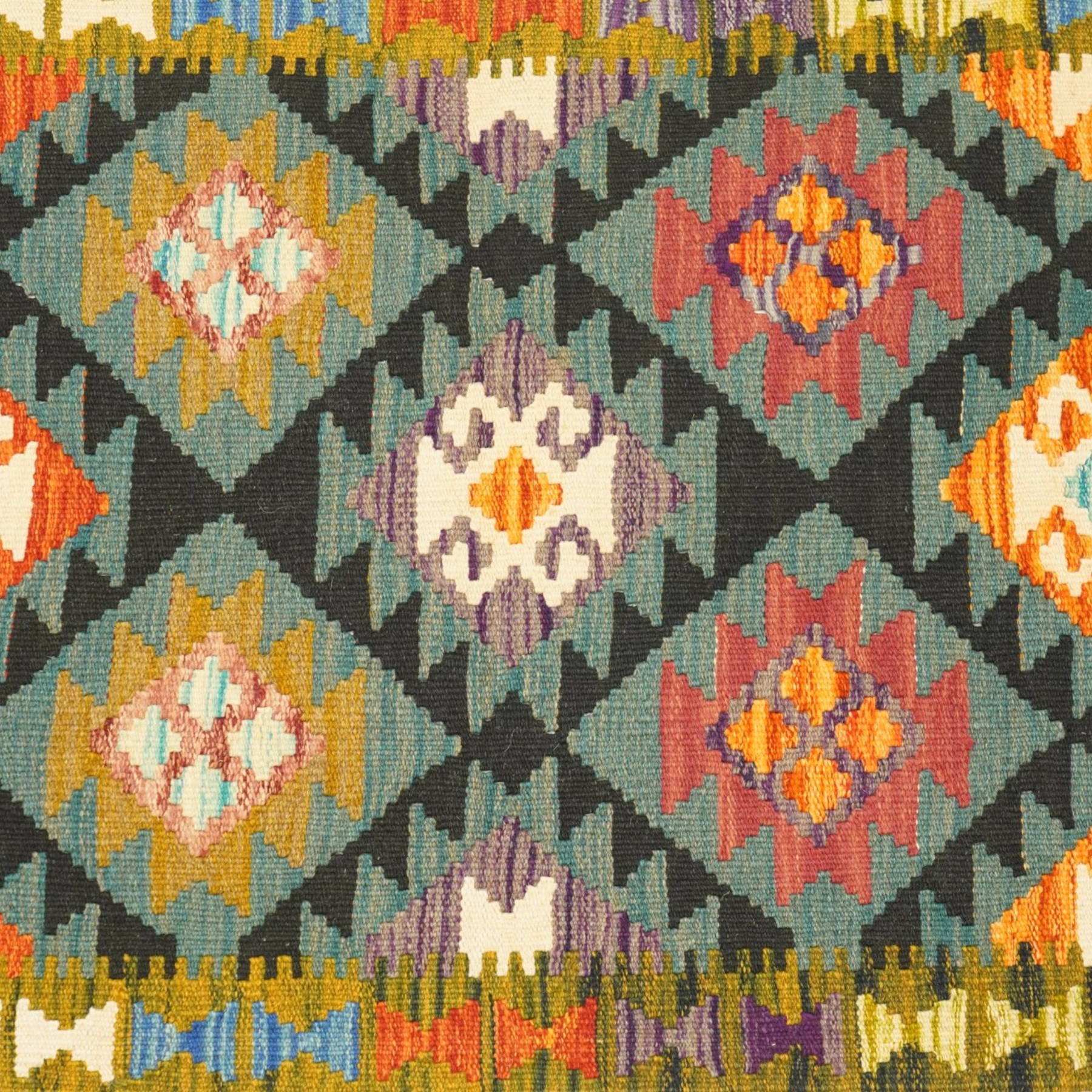 Afghan Chobi kilim flatweave runner rug, the central field decorated with geometric lozenge motifs on a teal ground, the olive guard band with repeating triangular motifs in contrasting colours