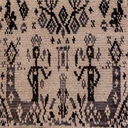Moroccan hand-knotted Berber rug, of rectangular form, ivory ground woven with horizontal bands of stylized tribal motifs, including abstract animals and anthropomorphic figures, interspersed with geometric devices, with fringe ends 