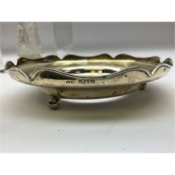 1920's silver stand, hallmarked Birmingham 1922, together with two tall faceted clear glass dressing table jars with hallmarked silver covers, and cut glass vase with hallmarked silver mounted collar, and small group of silver handled accessories, including files, picks, etc., approximate total silver weight 58.8 grams