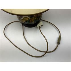 Moorcroft table lamp of squat baluster form, decorated in the Autumn Blackberry, with Moorcroft cream fabric shade with gold, green and red piping, overall H38cm